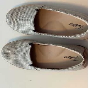 Trotters black and cream slip on slip on loafer.